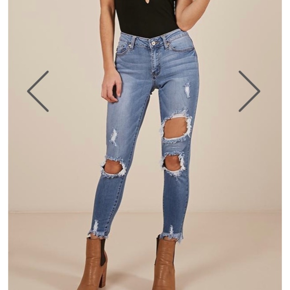 Showpo light wash jeans with frayed bottoms